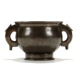 A CHINESE BRONZE SILVER INLAID “SHISOU” CENSER. Late Qing. Of blombé form, with stylised dragon