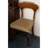 A pair of Victorian mahogany, bar back dining chairs, later overstuffed velour seats, turned legs