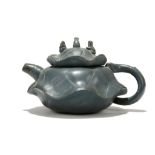 A GAO HAIGEN YIXING TEAPOT AND COVER. Second half of 20th Century. Finely modelled as a lotus leaf