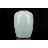 A CHINESE CELADON JAR. 19th Century. With incised decoration comprising a floral band around the