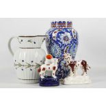 AN ENGLISH PEARLWARE JUG AND AN IZNIK-STYLE VASE, 19th century, the jug fluted and painted with a
