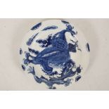 A SMALL BOW PLATE, circa 1760, painted in underglaze blue with the 'Dragon' pattern (14cm