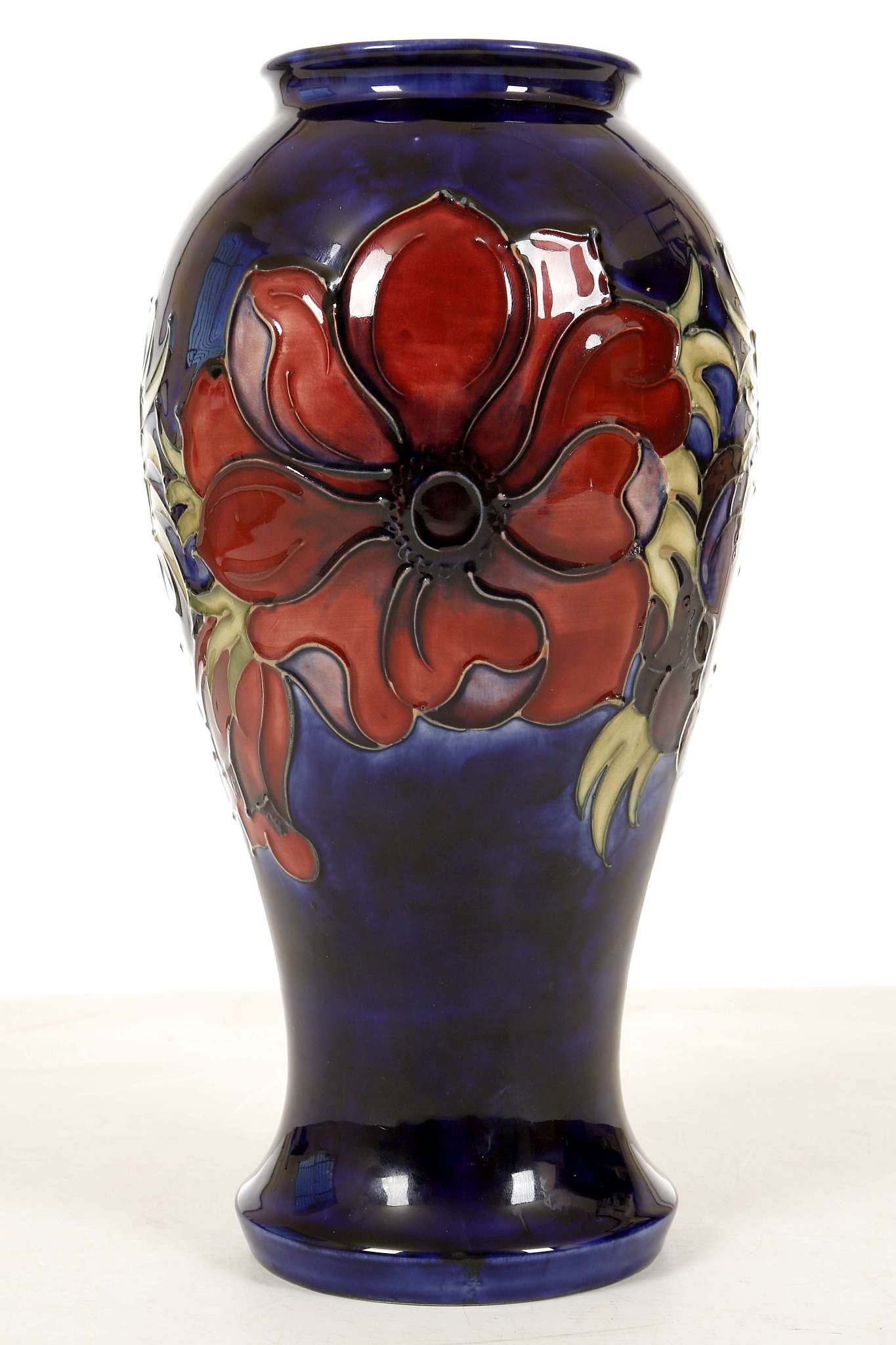 A WALTER MOORCROFT 'ANEMONE' VASE, circa 1950, of inverted baluster shape, decorated with a wide