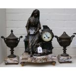 A late 19th century French clock garniture, the seated spelter female figure next to the monument