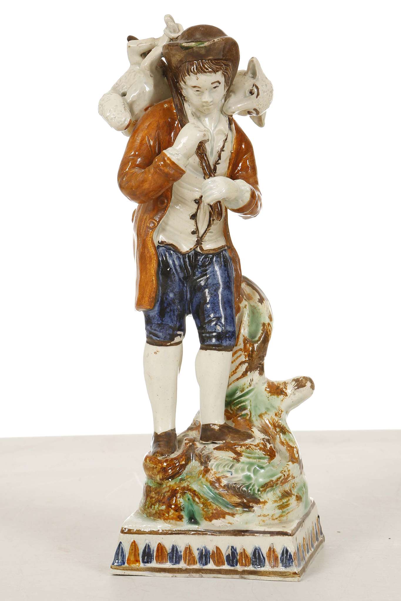 A FINE AND RARE PRATT WARE FIGURE OF THE 'LOST SHEEP FOUND', circa 1800-10, finely modelled as a