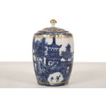 A CAUGHLEY TEA CANISTER AND COVER, circa 1785-90, of fluted ovoid form, printed in blue with the '