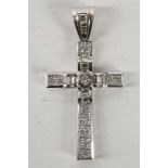 An 18ct white gold and diamond set cross pendant (4+ cts)