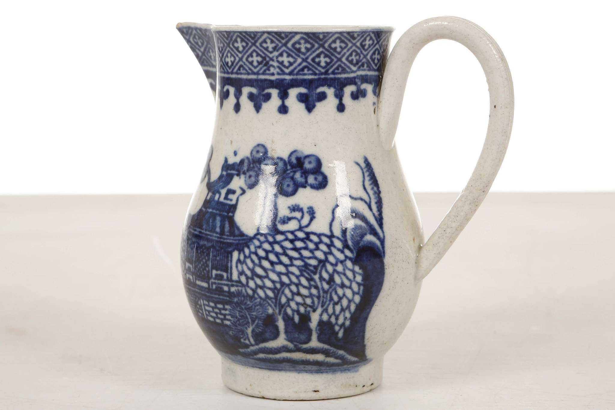 A RARE AND UNUSUAL ENGLISH CREAM JUG, 18th century, possibly Liverpool, of sparrow beak form with - Image 2 of 4