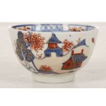 A LOWESTOFT TEABOWL, circa 1780, painted in the Imari palette of red, blue and gold with the '