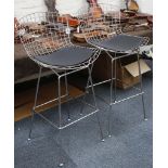 A PAIR OF HARRY BERTOIA STYLE BAR STOOLS, steel mesh design seat with black seat pad, on brushed