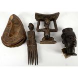 Four late 19th or early 20th century African tribal works of art from the Pygmy tribe, Forest of