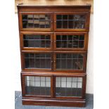 A pair of Minty type mahogany sectional bookcases, with leaded glazed doors