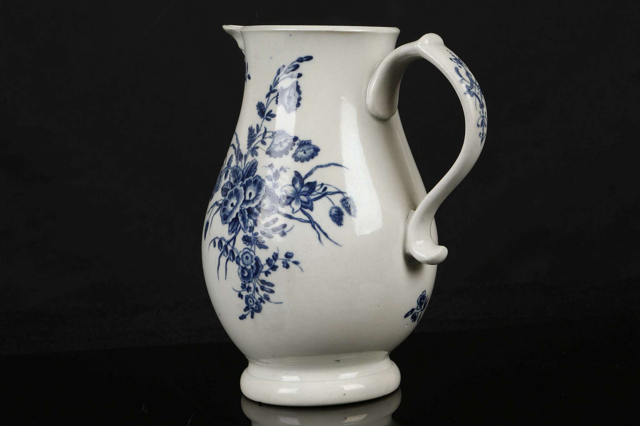 A WORCESTER MASK JUG, circa 1770, of baluster form printed in blue with the 'Bouquets' pattern (18cm - Image 2 of 4