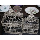 Two cream painted bird cages and two seeding potting trays (4)