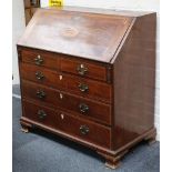 A Georgian mahogany bureau, with inlaid decoration and fall front over 4 long drawers