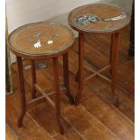 A pair of 1920's colonial Indian side circular shaped tables, inlaid on the top with mother of pearl