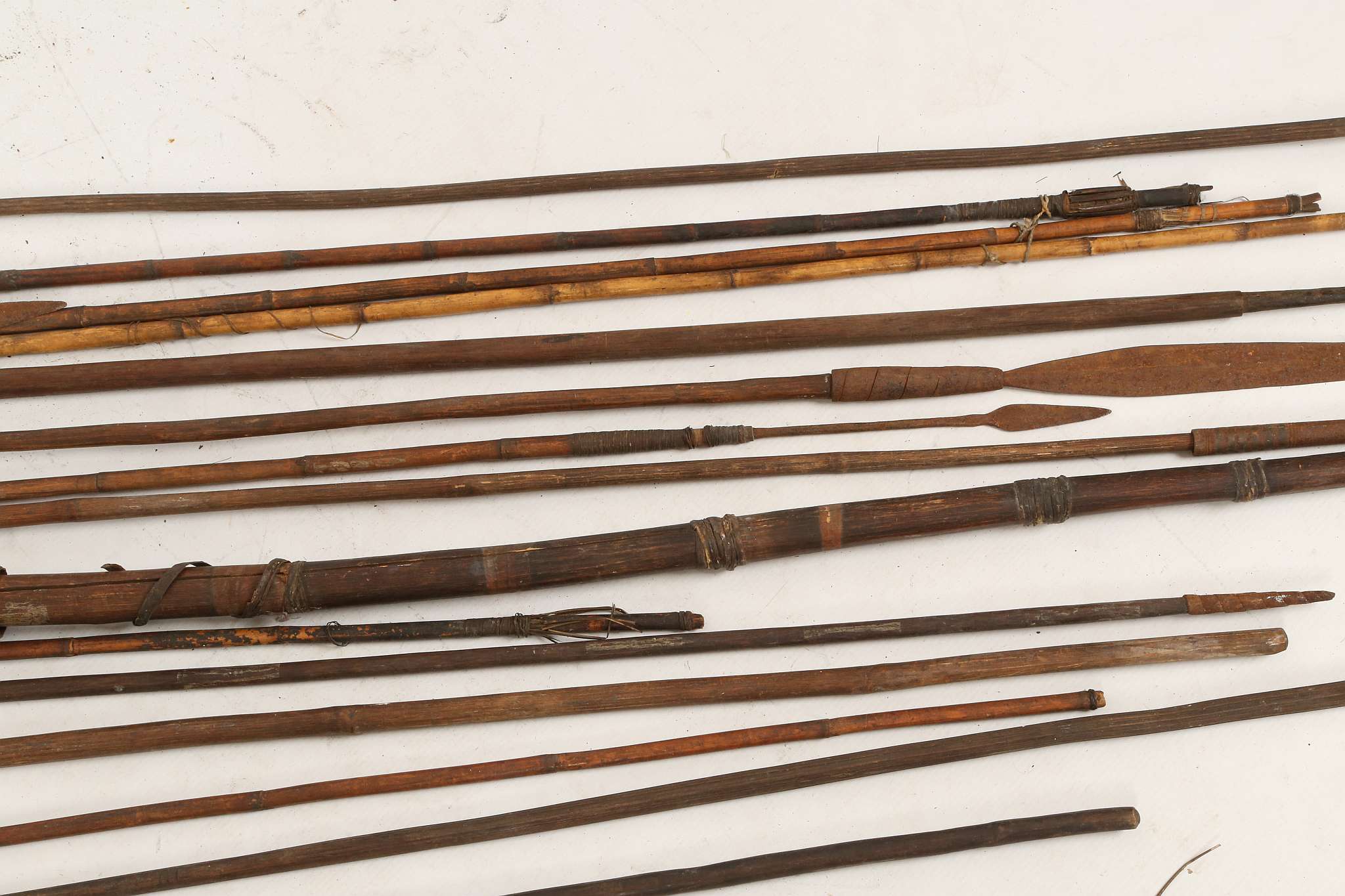 A tribal bow, split wood with grass banding, arrows, throwing spears with feather blade and barb - Image 5 of 5