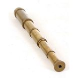 A mid Victorian brass pocket telescope, West Strand, London, 6 draw, 1" lens 15¾" max