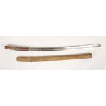 A Japanese katana with dha style tip, patinated brass and shagreen grip, curved 58.5 cm lade, bamboo