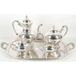 A mid 20th Century, Victorian style four piece silver plated tea service by A. Rogers, on a twin-