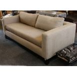 An Andrew Martin contemporary 3 seater sofa in neu