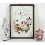 A Chinese framed picture of cranes, flying above flower,s composed of brightly coloured shell