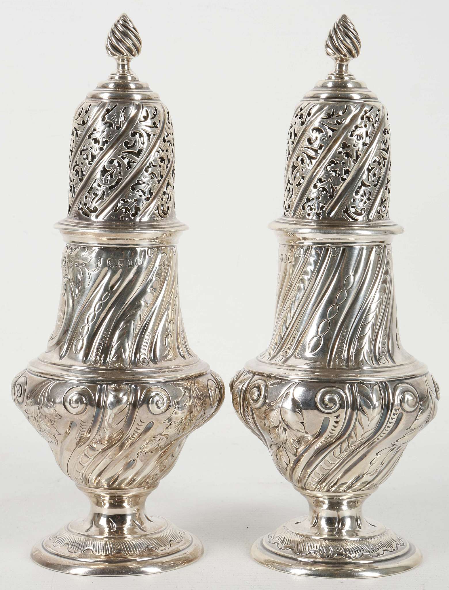 A pair of 1887 hallmarked silver sugar castors, Thomas Bradbury & Sons, London