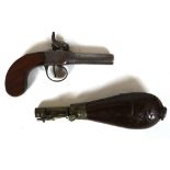 A 19th Century continental percussion cap pistol, walnut grip, engraving to body and trigger