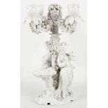 A Marcolini period Meissen blanc de chine candelabra, with four branches, the stem with a pair of