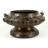 An antique cast bronze archaic shaped pedestal bowl, applied with lizard frog and Afghan dog,