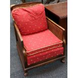 A pair of early 20th Century Bergere box side chairs, pad feet, contemporary upholstery