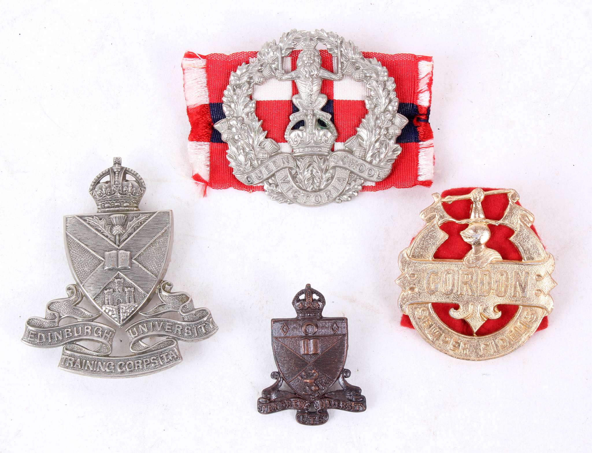 Military cap badges; Edinburgh University Training Corps (T.A.), St. Andrew's University (U.T.C.),