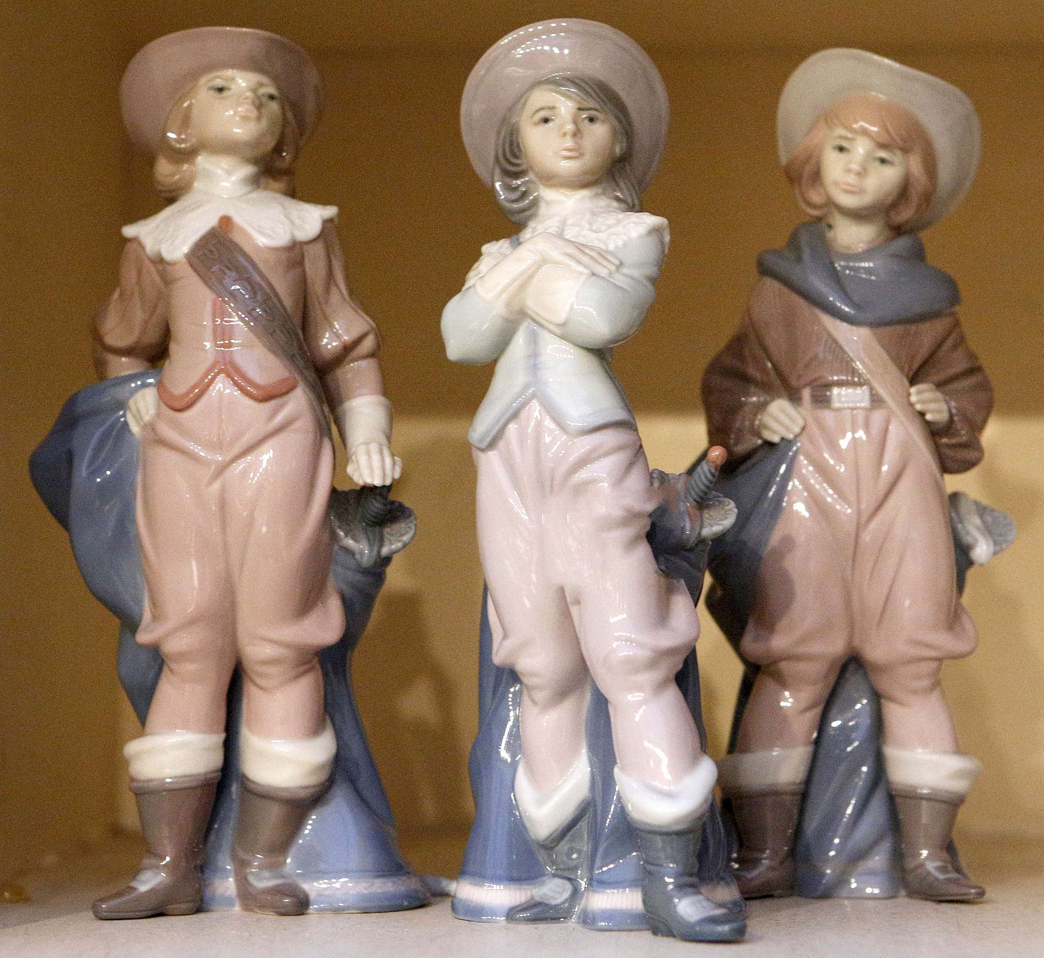 Three Lladro porcelain figures (Musketeers) (3)