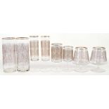An Edwardian suite of engraved and gilded glassware having 12 each of 5 sizes (60)
