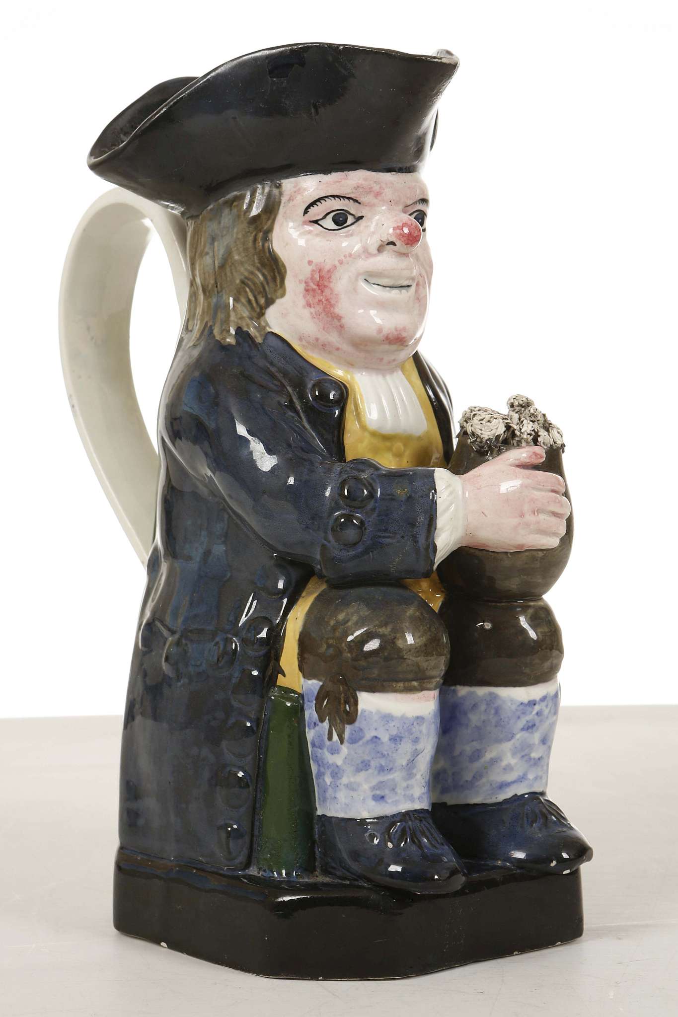 A Staffordshire Toby jug and a Yorkshire Toby jug,