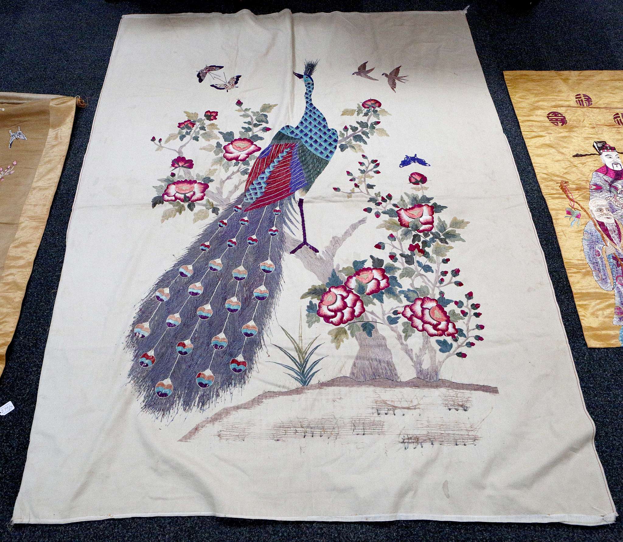An early 20th Century Chinese silk embroidered panel with peacock surrounded by peonies, 185 x - Image 3 of 4