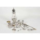 A quantity of hallmarked and continental silver to includes napkin rings, spoons, baby's rattle /