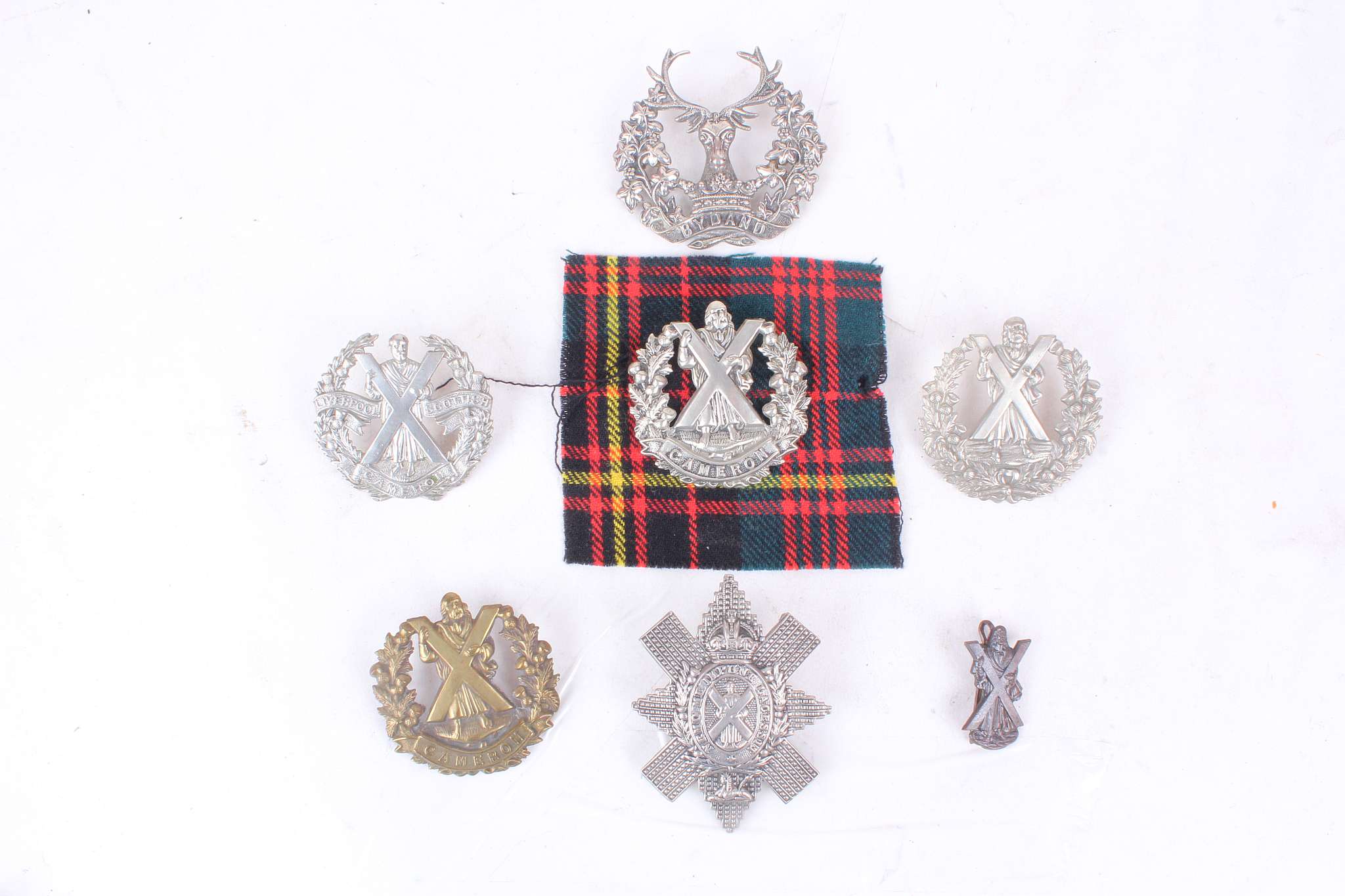 British Army military cap badges; Cameronians, Black Watch & Gordons Scottish Glengarry badges &