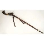 Islamic flintlock musket, 19th Century, Persian style (camel gun), fan / axe head butt, brass and