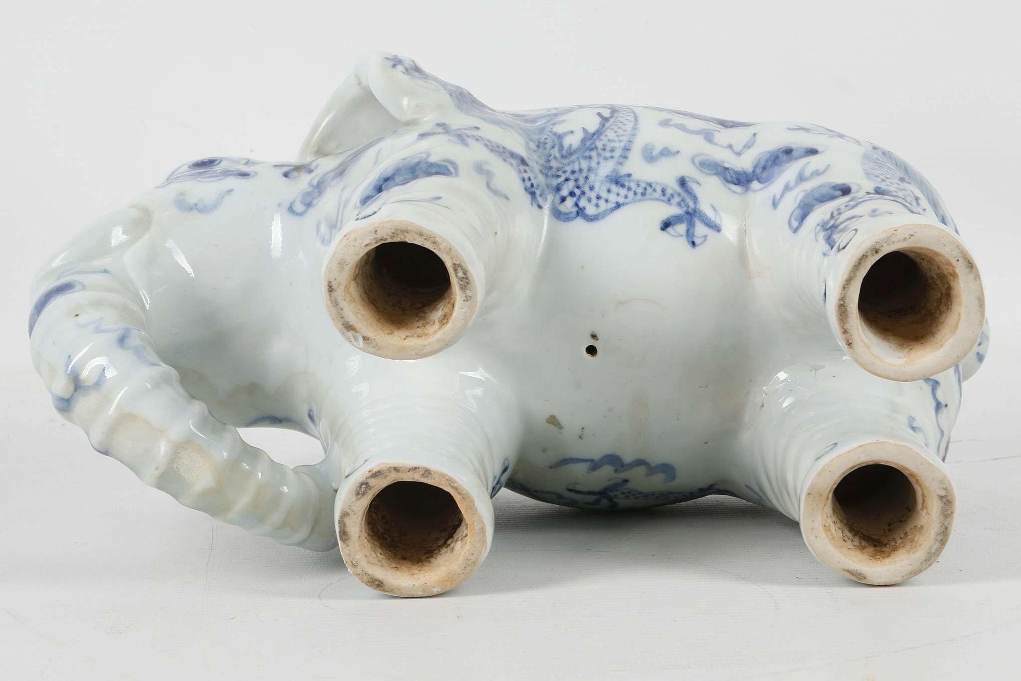 A Chinese blue and white porcelain model of an elephant, the body decorated with dragons chasing - Image 3 of 3