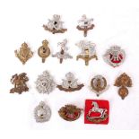 British Army military cap badges; mixed line Regiments inc. Cornwall Light Infantry, The Buffs,