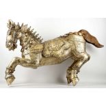 A pair of antique Indian carved and giltwood stallions, 36cm long (2)