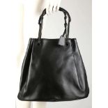 GUCCI BUCKET BAG, black leather with rolled and stitched short handles, attached coin purse, 32cm