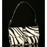 DOLCE AND GABBANA PONY SKIN HANDBAG, zebra pattern with patent leather trim and unusual fastening,