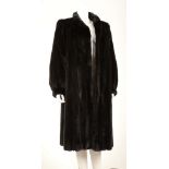 BLACKGLAMA BLACK MINK COAT, three quarter length with puff sleeves, approx size UK 14-16