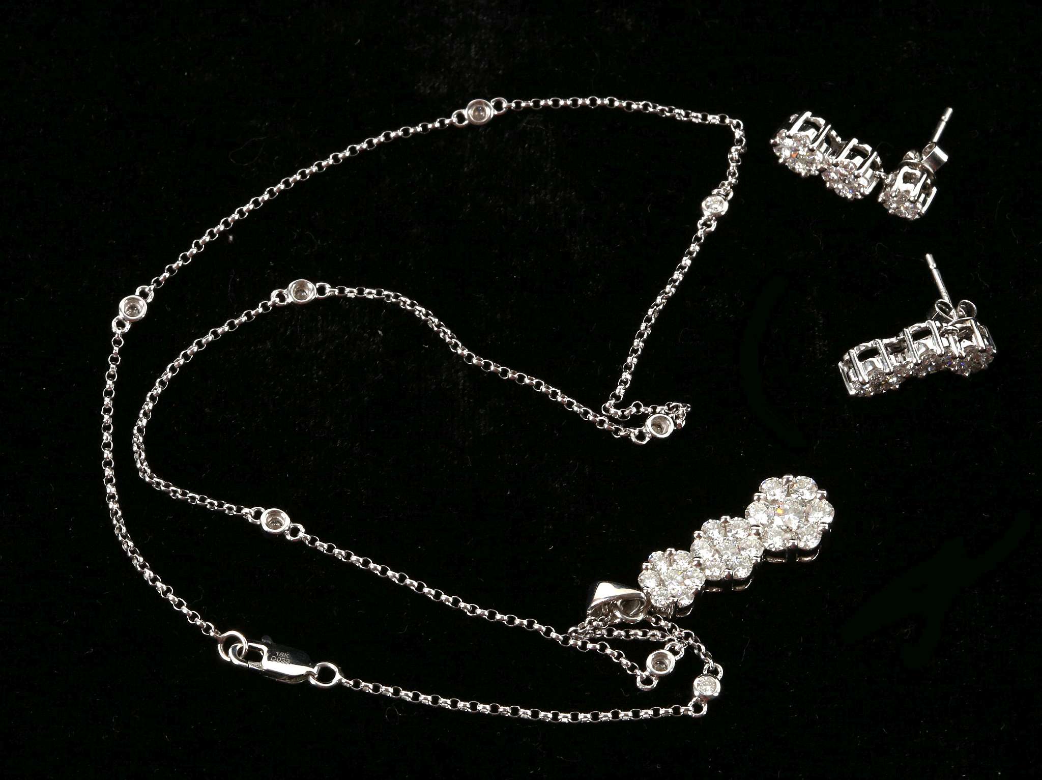 An 18ct white gold and diamond set, graduated triple cluster pendant, with diamond set chain and - Image 4 of 4
