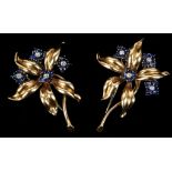 A pair of Cartier 14k floral cup brooches, set with cabouchon sapphire and diamonds