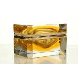 A 1950's MURANO GLASS CASKET, in amber coloured cl