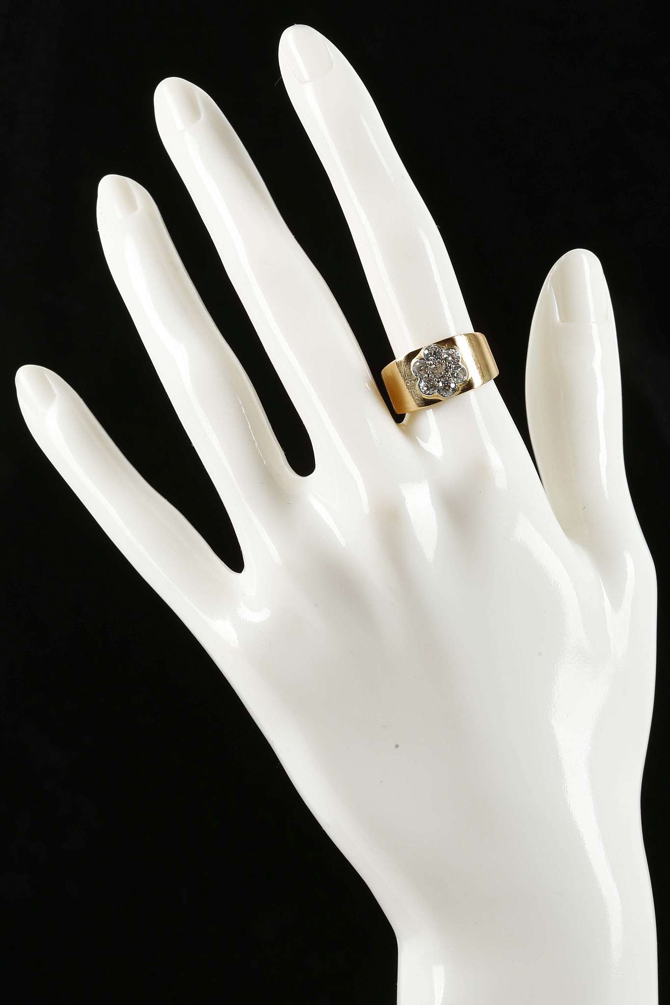 An 18ct band ring with applied diamond set floral lustre - Image 2 of 2