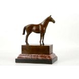 After Andre, a bronze figure of a racehorse, on bronze pedestal and marble plinth, 23cm high